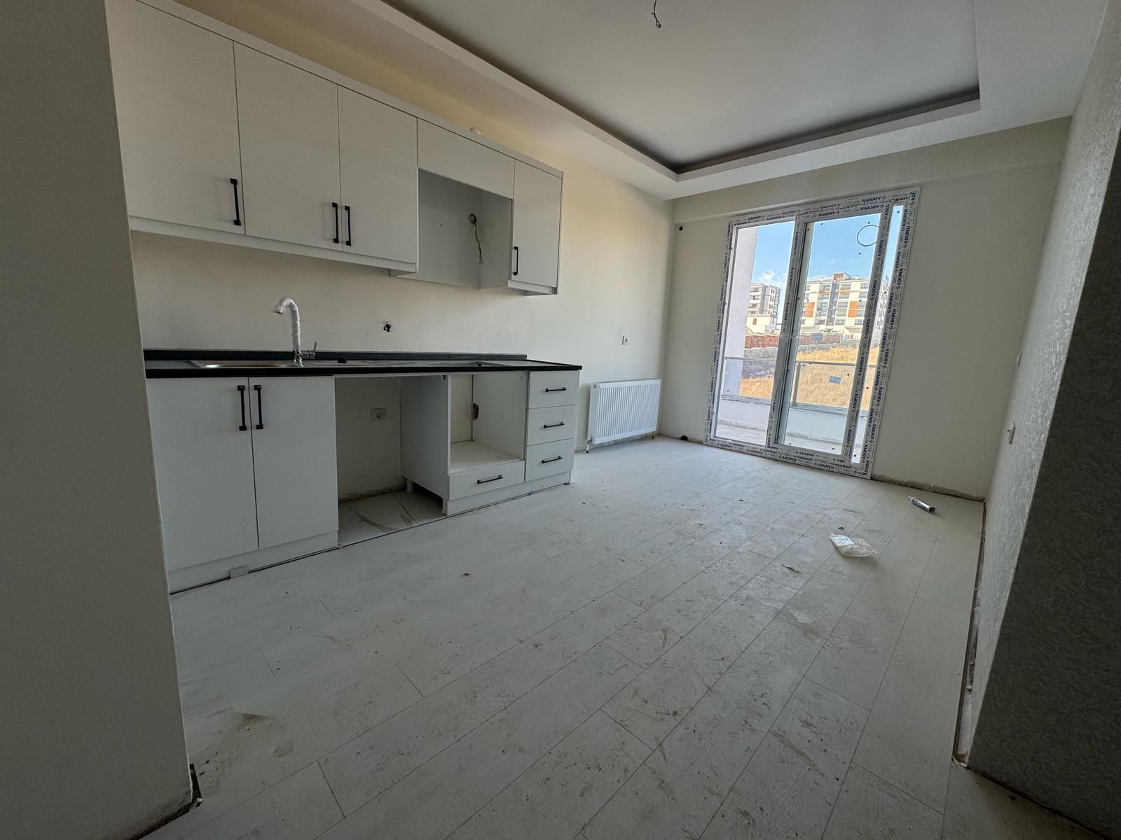 TEKNO KENT ARKASINDA TAKASA AÇIK 2+1 SATILIK DAİRE